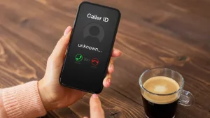 Person answering a call on cell phone